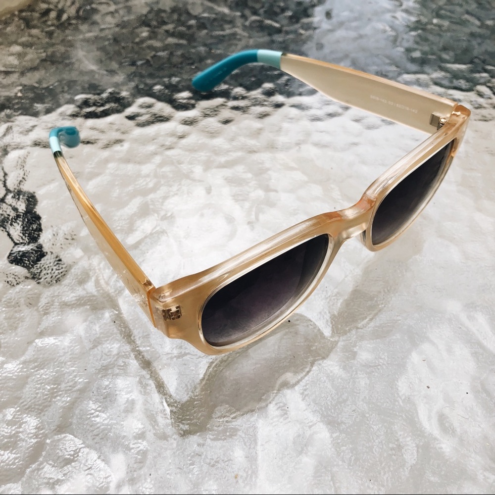 TOMS sunglasses.